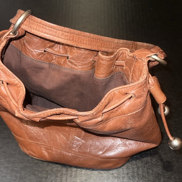 Vintage Brown Leather Drawstring Bucket Bag with Silver Hardware - Picture 6 of 9